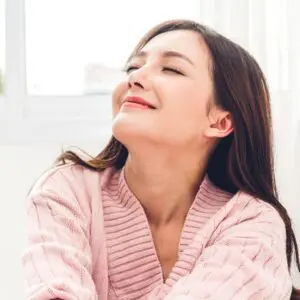 Woman smiling in her home