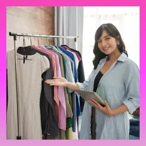 estate sale professional displaying clothes